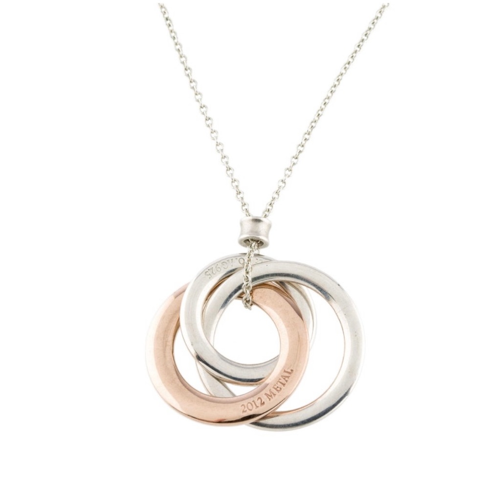 Tiffany & Co. Interlocking Circles Rubedo & Silver Pendant Necklace.